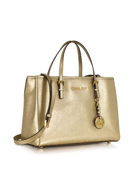 michael kors jet set travel tz tote pale gold|Michael Kors bag with airplanes.